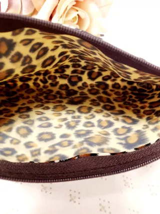 Neceser estampado leopardo