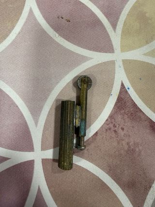 Mechero antiguo de latón y cuerda