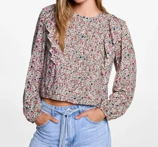 Blusa estampada con volantes