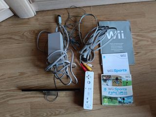 Ninteno Wii + Wii Sports.