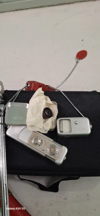 Cámara espía Minox Siglo XX y Fotometro