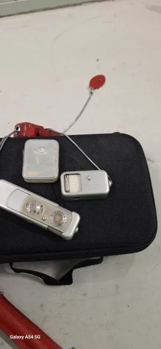 Cámara espía Minox Siglo XX y Fotometro