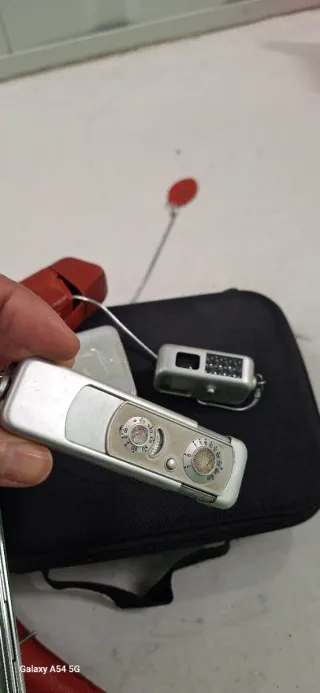 Cámara espía Minox Siglo XX y Fotometro