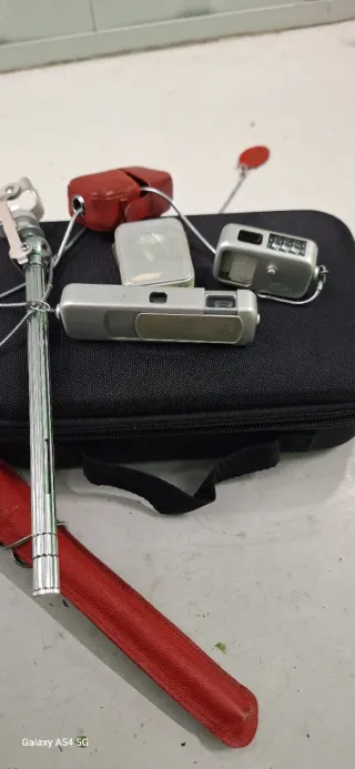 Cámara espía Minox Siglo XX y Fotometro