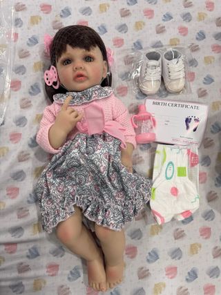 Muñeca bebé realista con accesorios