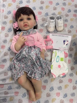 Muñeca bebé realista con accesorios