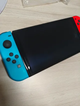 Nintendo Switch OLED Azul y Naranja con garantia