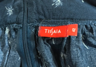 Falda corta azul marino con palmeras