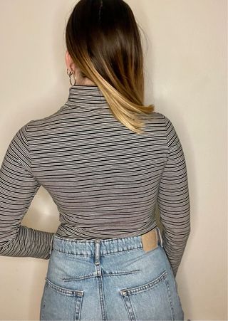 Jersey cuello alto rayas blanco y negro