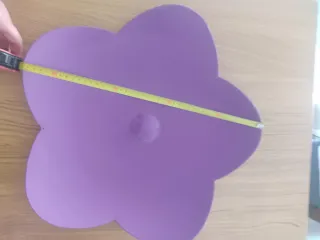 Centro de mesa flor morada, naranja y rosa