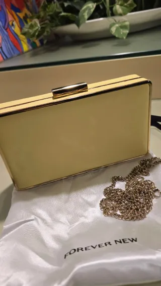 Pochette con strass oro e giallo