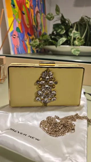 Pochette con strass oro e giallo