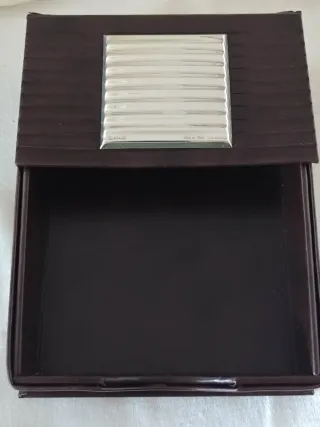 Svuotatasche e porta posta in pelle e argento