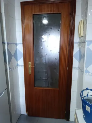 Puerta de paso con cristal