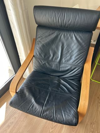 Butaca de piel con reposapiés