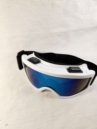Gafas de esquí blancas con lente azul