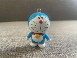 Lote 3 figuras Hello Kitty, Doraemon, Pikachu