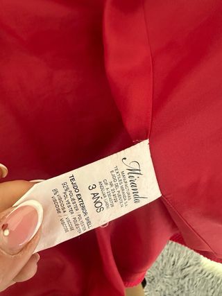 Abrigo niña rojo con volantes y lazo