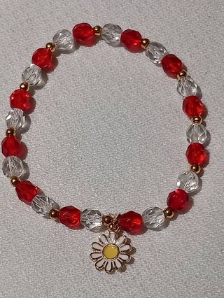 Pulsera con abalorio flor dorada y roja