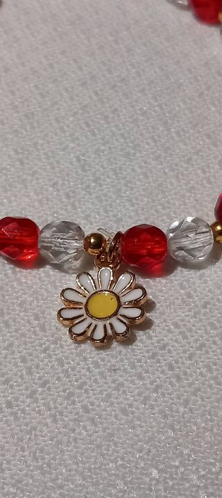 Pulsera con abalorio flor dorada y roja