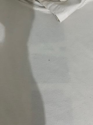 Camiseta sin mangas con capucha blanca