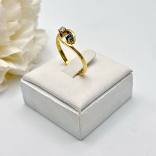 Anillo oro 18kt con circonita y zafiro