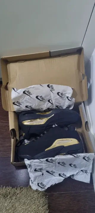 Tênis NIKE x NOCTA Preto e Dourado