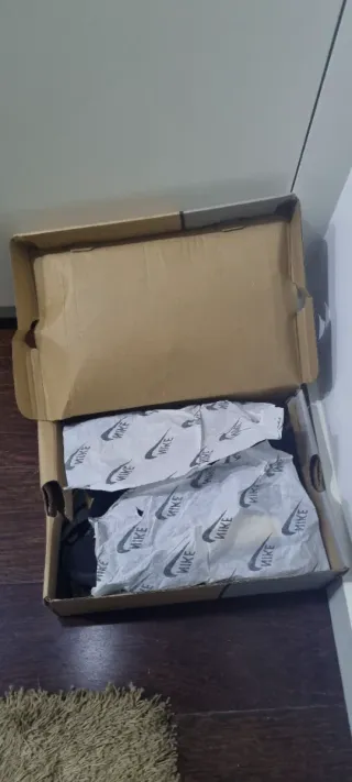 Tênis NIKE x NOCTA Preto e Dourado