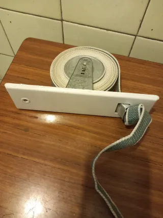 Recogecintas persiana blanco