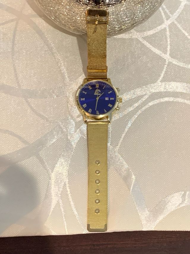 Reloj G Azul y Dorado