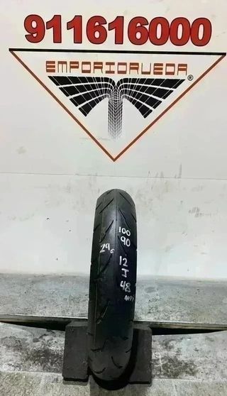 100 90 12 J BRIDGESTONE RUEDA AL 90% VIDA UTIL