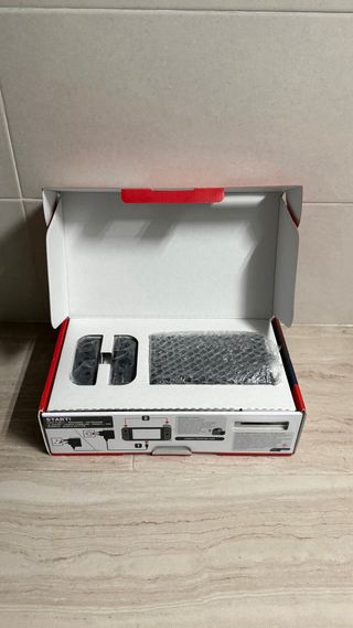 Nintendo Switch V2 + Caja y Accesorios