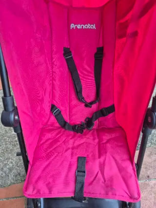 Silla de paseo Prenatal rosa.