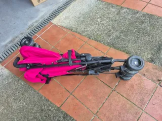 Silla de paseo Prenatal rosa.