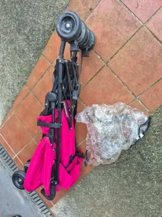 Silla de paseo Prenatal rosa.