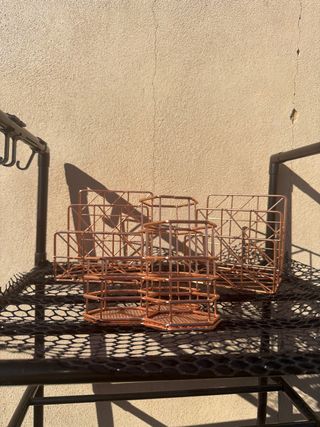 Supporto libri e penna oro rosa