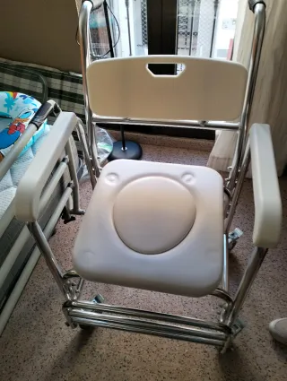 Sillón water con ruedas a estrenar