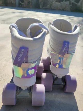 Patines de niña blancos con ruedas lilas