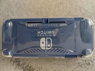 Nintendo Switch Lite Azul + funda de viaje