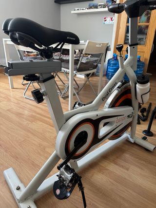 Bicicleta estática dual cross y mancuernas