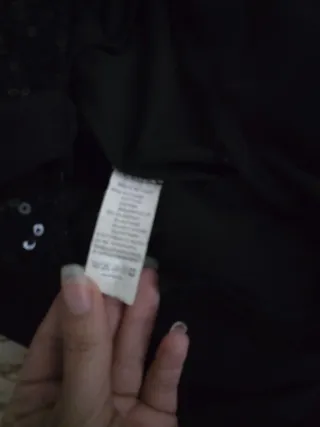 Vestito nero con paillettes e ricami