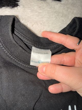 Camiseta Negra Manos Unidas Talla M