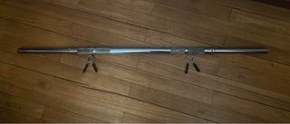 Barra musculación + 2 discos 10Kg y 2 discos 5Kg