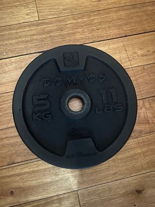 Barra musculación + 2 discos 10Kg y 2 discos 5Kg