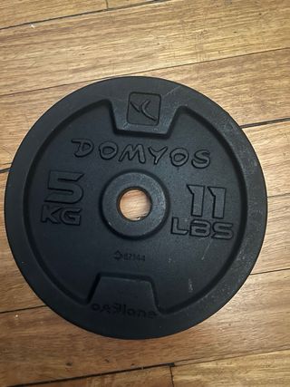 Barra musculación + 2 discos 10Kg y 2 discos 5Kg