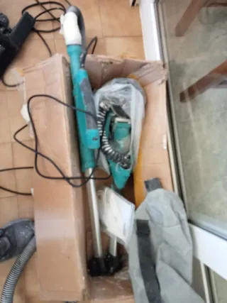 Girafa para lijar paredes