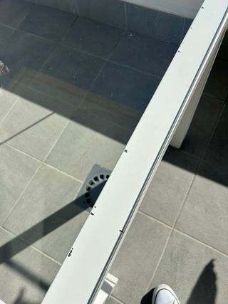 Tavolo in ferro battuto con piano in vetro