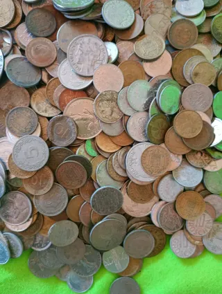 4.5 kilos de monedas variadas usadas