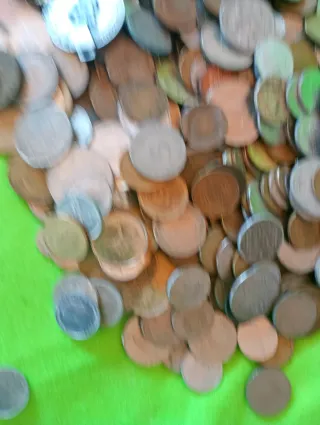 4.5 kilos de monedas variadas usadas