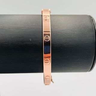 PULSERA RIGIDA TORNILLO ORO ROSA.